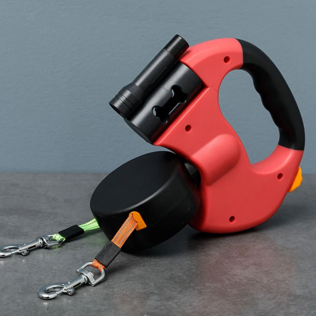 Lesa retractabilă pentru câini – cu lampă LED și distribuitor de saci