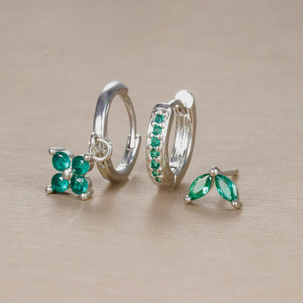 Ensemble Ohrringe und Piercings – Vielseitigkeit und subtile Brillanz